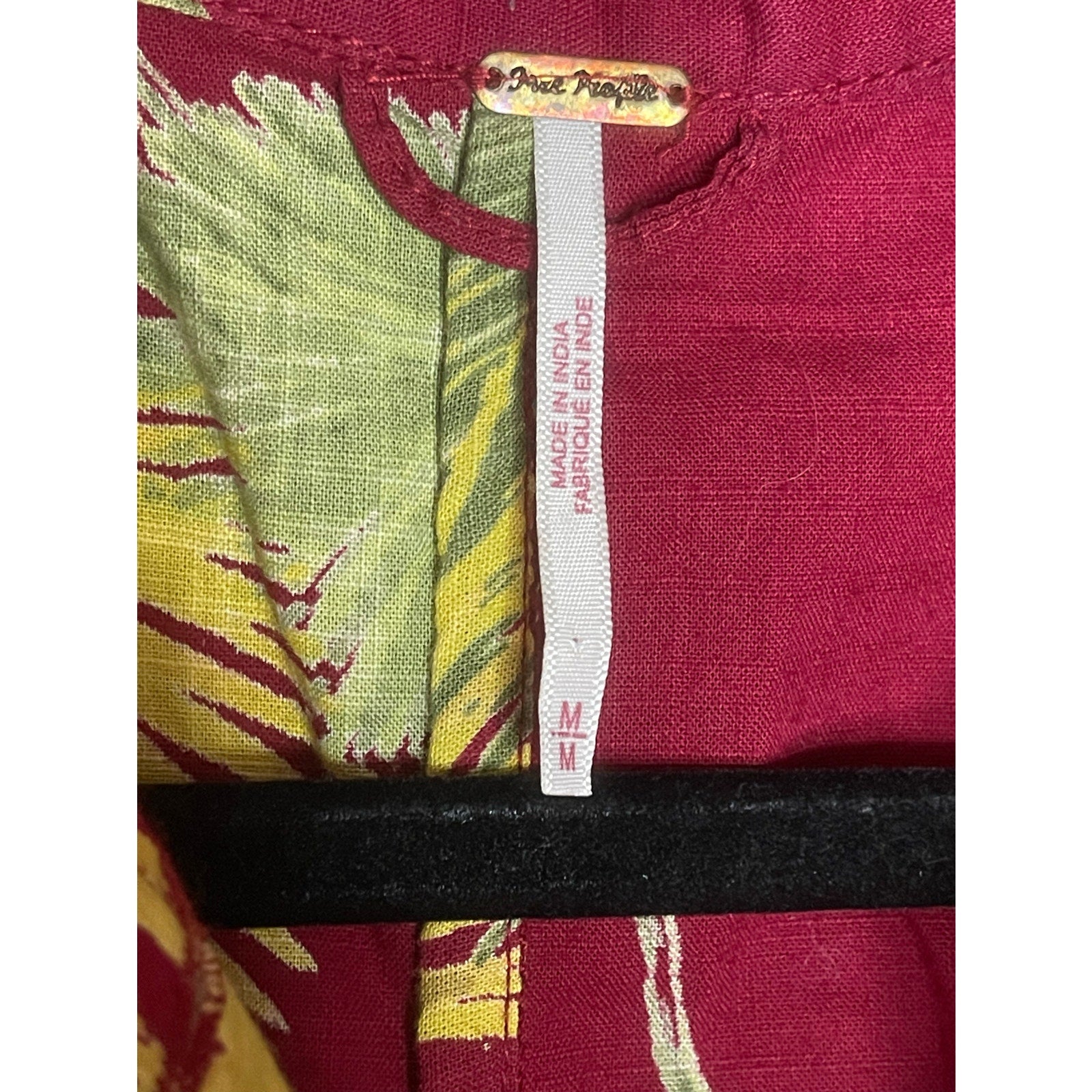 free people maroon romper tag