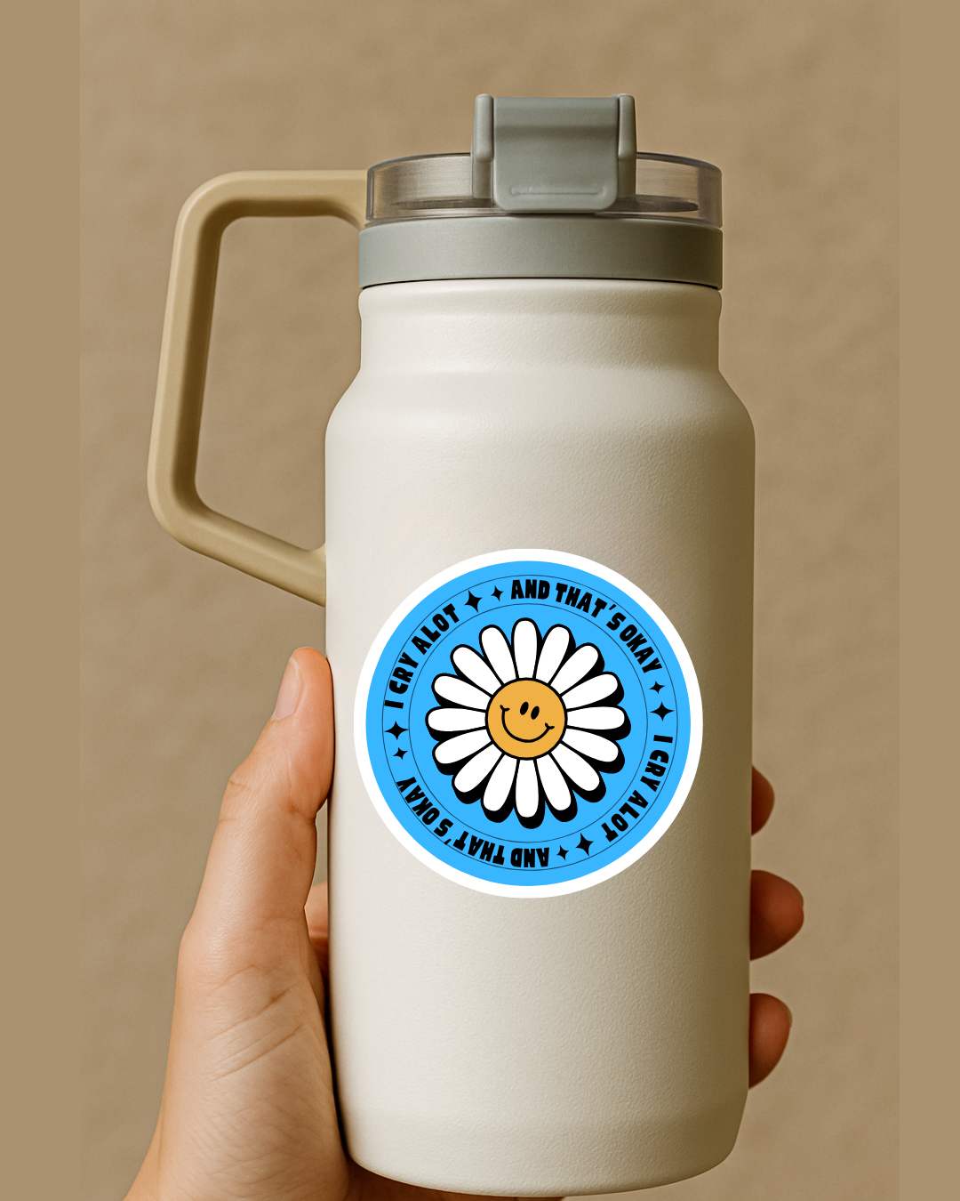 i cry alot and that's okay blue circular sticker on water bottle