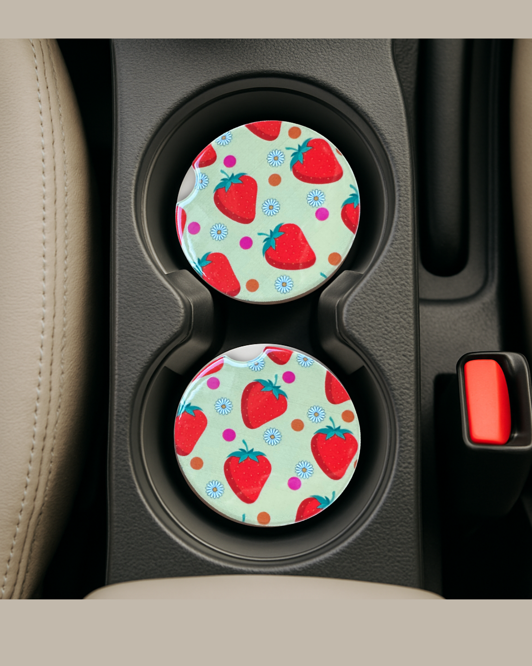 strawbwerry print ceramic car coasters in a car's cup holder