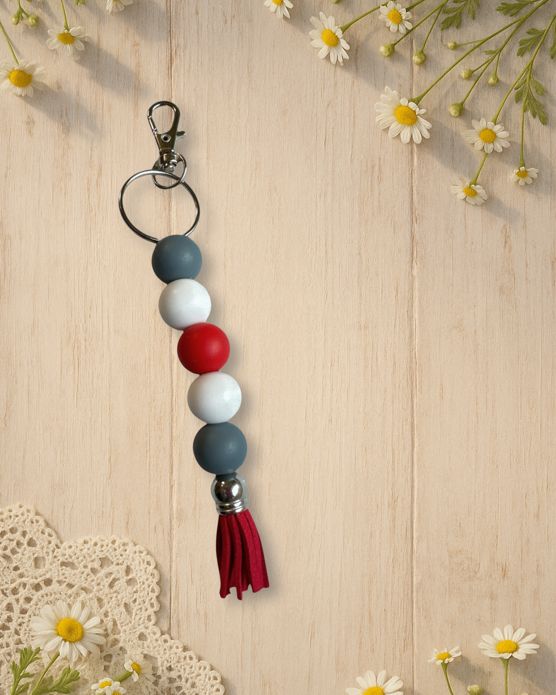 grey+white+red+red tassel silicone bead standalone keychain