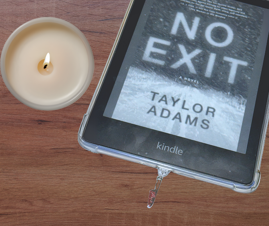 A USB-C dust plug designed to look like a metal knife with the phrase 'Killing It' on it, next to a Kindle e-reader with a candle on the left side, all placed on a wooden surface.