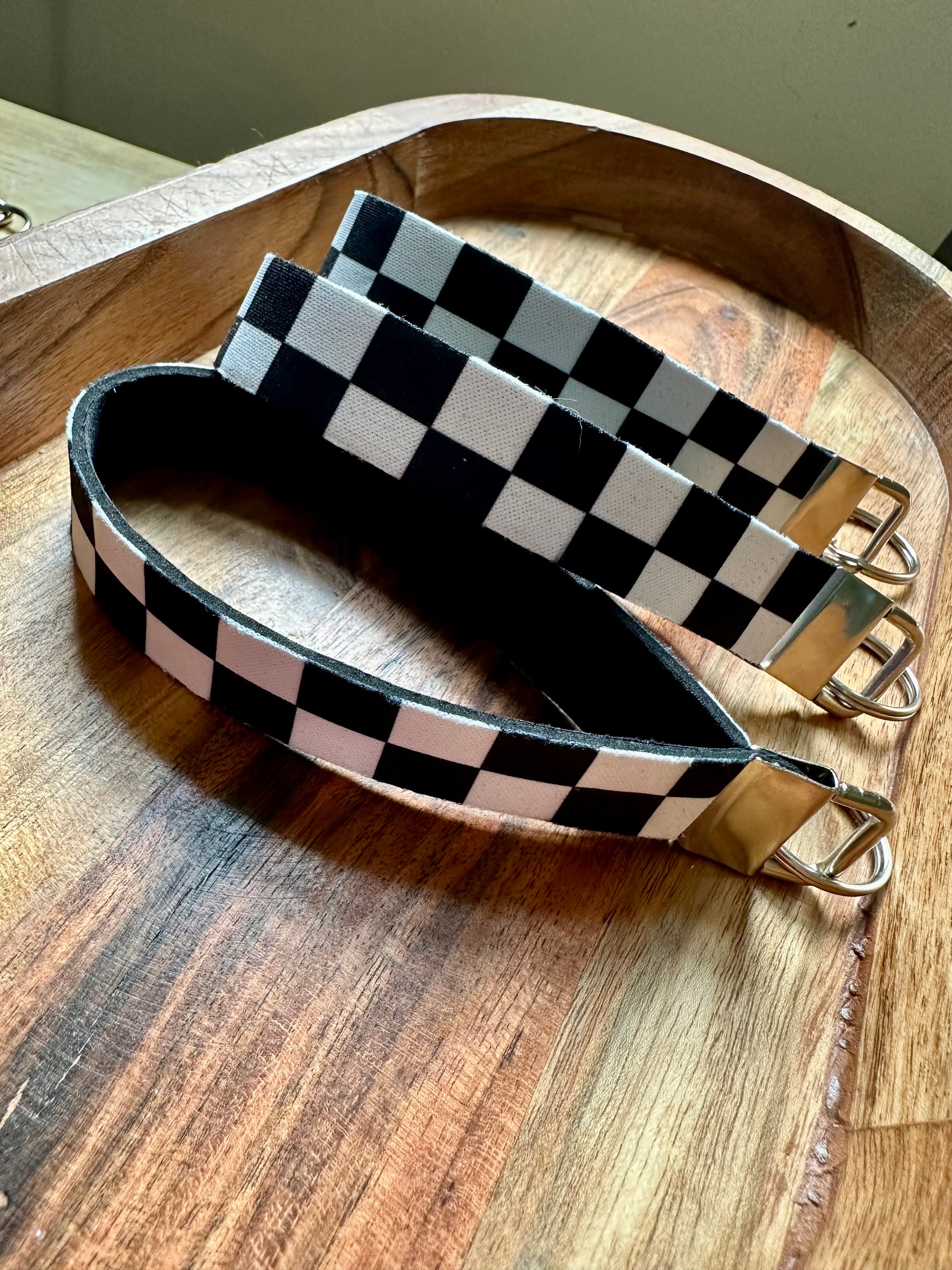 Neoprene key fob designed with black and white checkered print on the front only