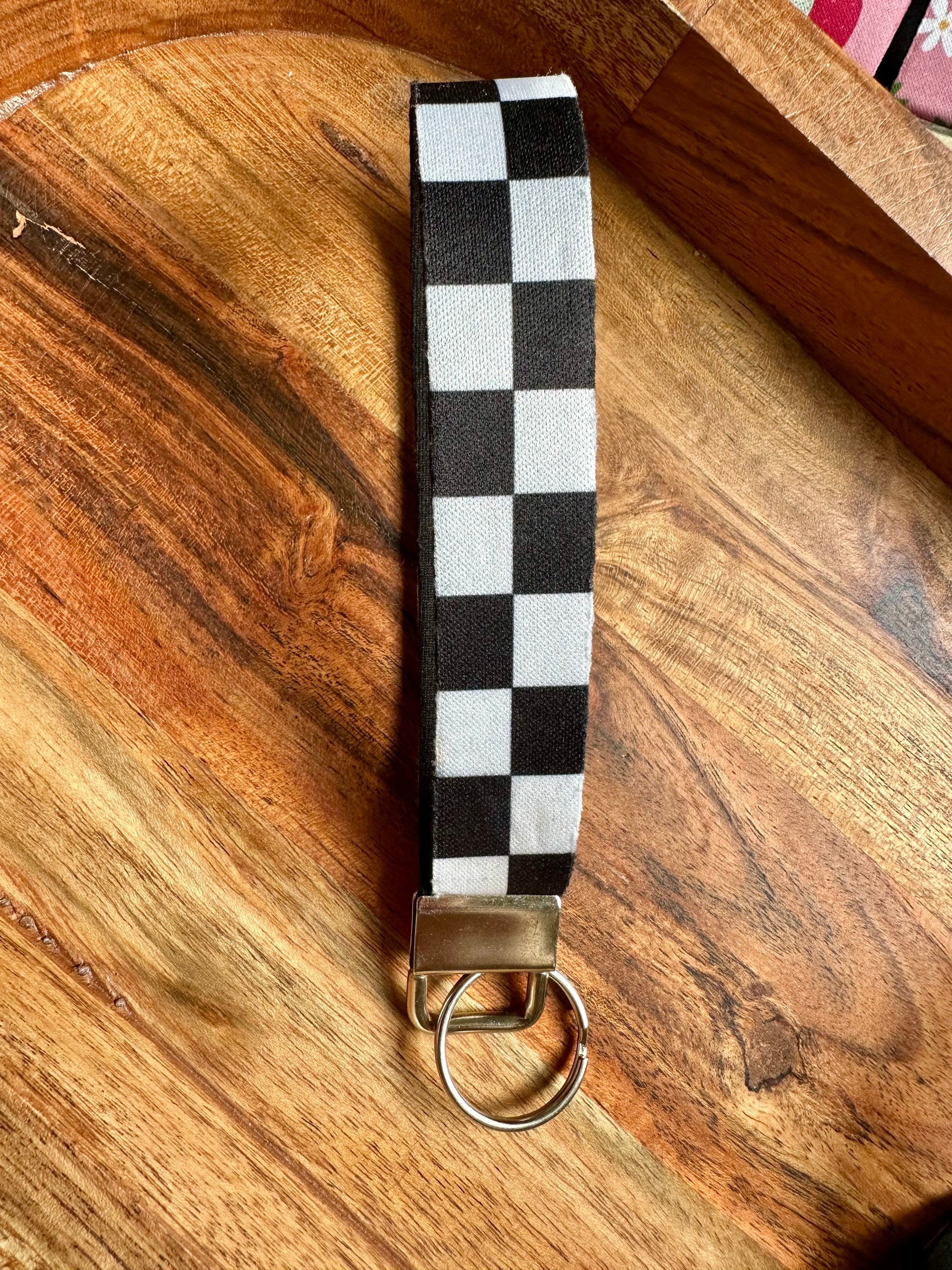 Neoprene key fob designed with black and white checkered print- front picture